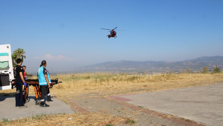 Dağlık alana düşen paraşütçü ambulans helikopterle hastaneye sevk edildi